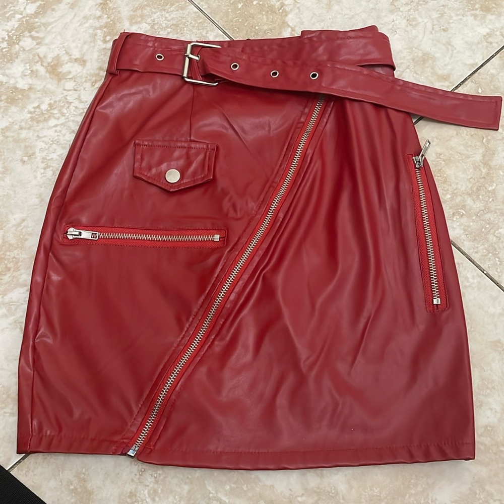Red skirt with zippers and belt leather